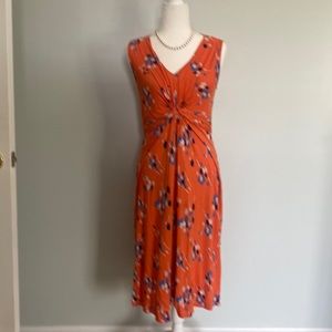 Boden women’s sleeveless dress in a cheery orange print.Size M